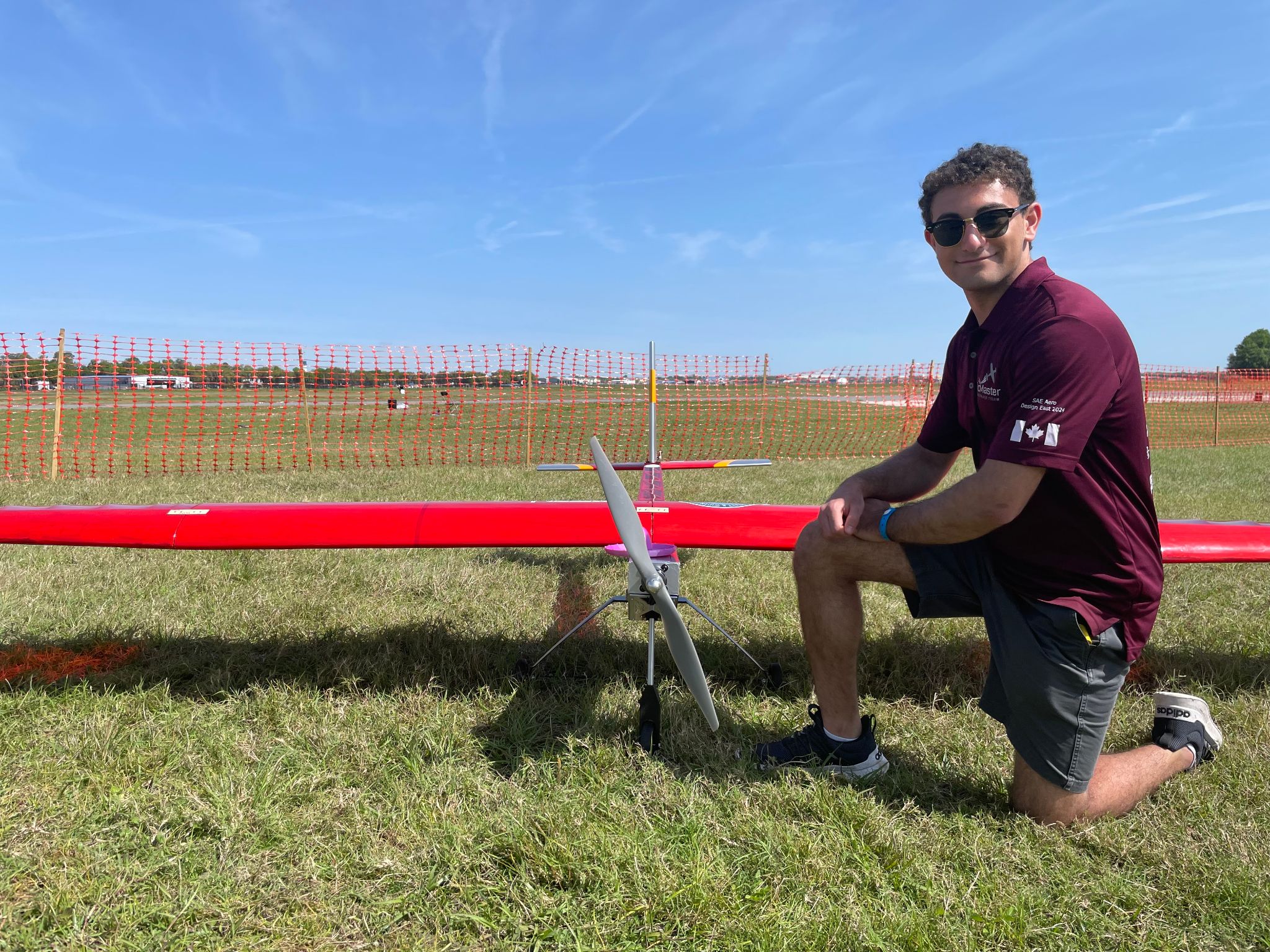 Adrian Hanna working with the McMaster Aerospace Team aircraft
